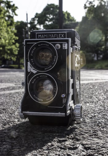 Shallow Focus of Black Road Camera