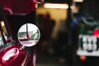 shallow focus of car wing mirror