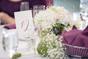 Shallow Focus of Flowers and Wine Glasses