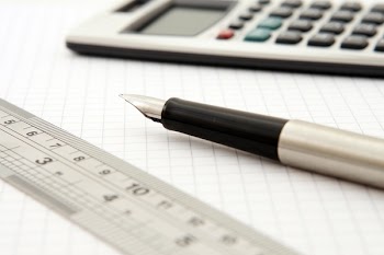 Shallow Focus of Silver and Black Fountain Pen Beside Ruler and Scientific Calculator