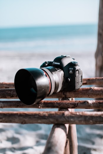Shallow Focus Photo of Black Canon Dslr Camera