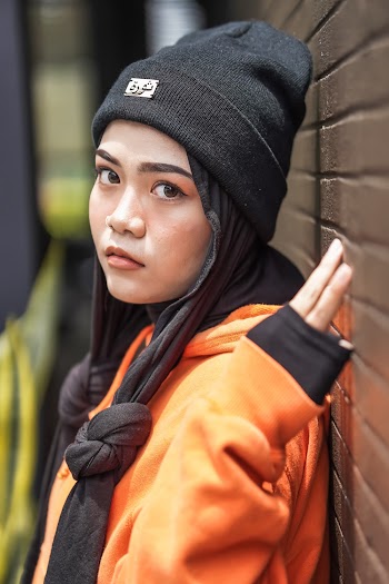 Shallow Focus Photo of Black Knit Cap