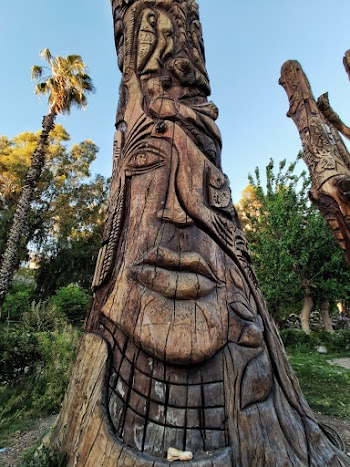 Shallow Focus Photo of Brown Wooden Totem Pole