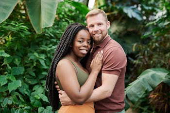 Shallow Focus Photo of Couple Embracing