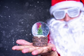 Shallow Focus Photo of Crystal Ball on Person's Hand