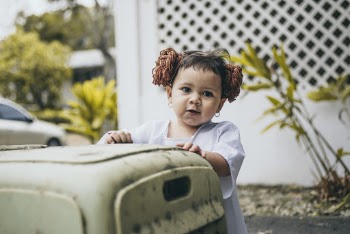 Shallow Focus Photo of Girl in White Shirt