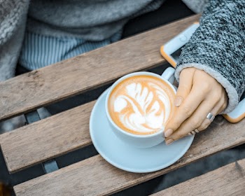 Shallow Focus Photo of Latte in White Ceramic Mug