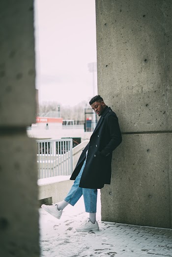 Shallow Focus Photo of Man in Black Trench Coat