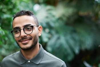 Shallow Focus Photo of Man Wearing Eyeglasses