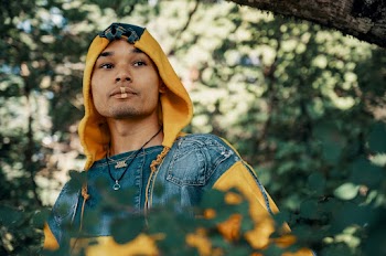 Shallow Focus Photo of Man Wearing Hoodie