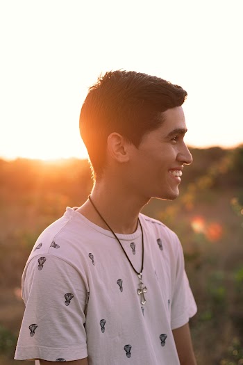 Shallow Focus Photo of Man Wearing White Shirt