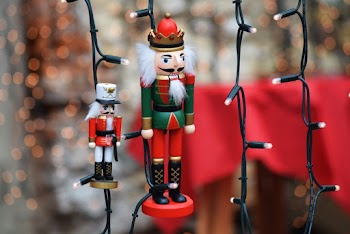 Shallow Focus Photo of Nutcrackers Figurine