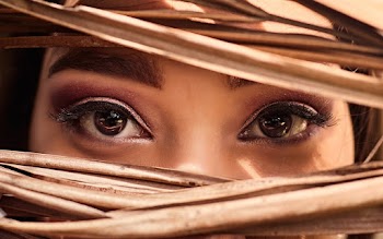 Shallow Focus Photo of Person's Black Iris