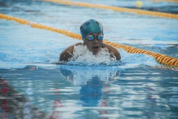 Shallow Focus Photo of Person Swimming