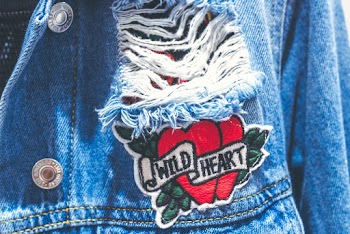Shallow Focus Photo of Red Heart Patch