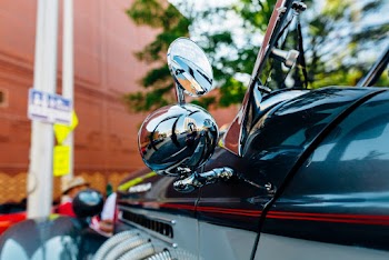 Shallow Focus Photo of Side Mirror