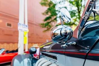 Shallow Focus Photo of Side Mirror