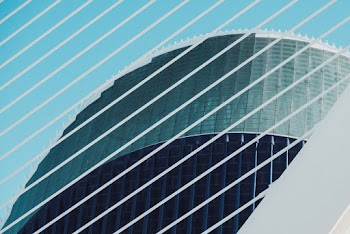 Shallow Focus Photo of White and Blue Building