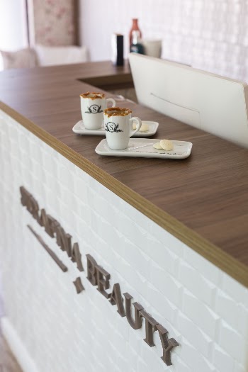 Shallow Focus Photo of White Ceramic Mugs on Brown Wooden Counter Table