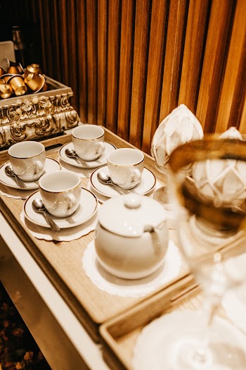 Shallow Focus Photo of White Ceramic Teapot Set