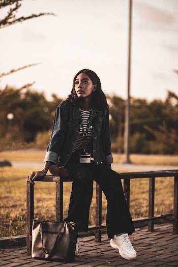 Shallow Focus Photo of Woman in A Denim Jacket
