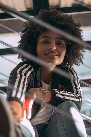 Shallow Focus Photo of Woman in Black Adidas Full-zip Jacket