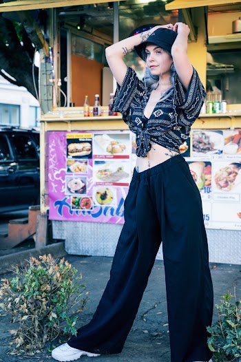 Shallow Focus Photo Of Woman In Black Crop Top