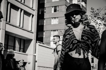 Shallow Focus Photo Of Woman In Black Crop Top Wearing Bucket Hat