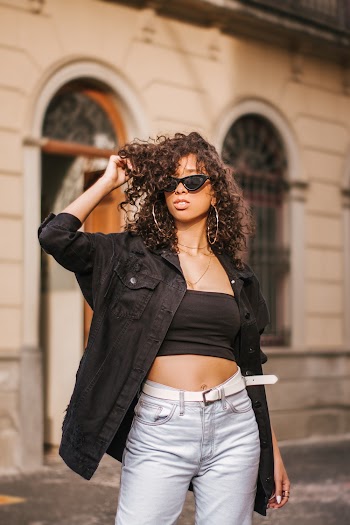 Shallow Focus Photo Of Woman In Black Jacket