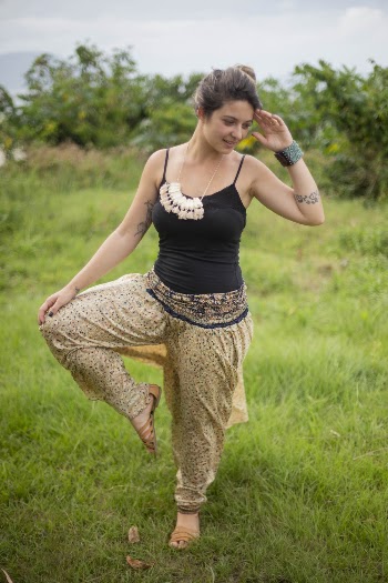 Shallow Focus Photo of Woman in Black Spaghetti Strap Top