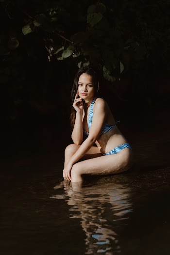 Shallow Focus Photo of Woman in Blue Bikini