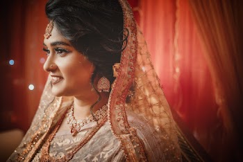 Shallow Focus Photo of Woman in Brown and Gray Sari Dress