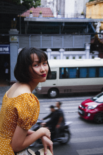 Shallow Focus Photo of Woman in Orange Top