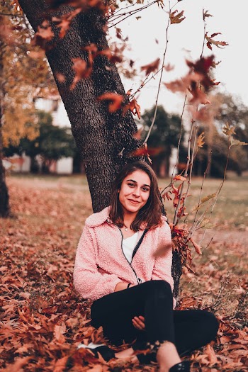 Shallow Focus Photo of Woman in Pink Full-zip Jacket
