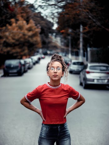 Shallow Focus Photo Of Woman In Red Crew Neck T-shirt