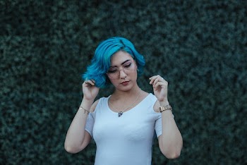 Shallow Focus Photo of Woman in White Cold-shoulder Shirt
