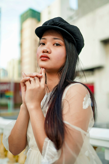 Shallow Focus Photo of Woman Wearing Black Hat