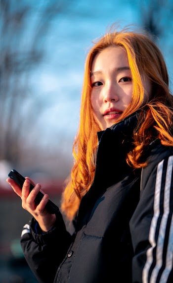 Shallow Focus Photo of Woman Wearing Black Jacket