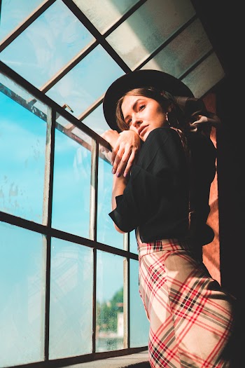 Shallow Focus Photo of Woman Wearing Black Wide Brim Fedora Hat