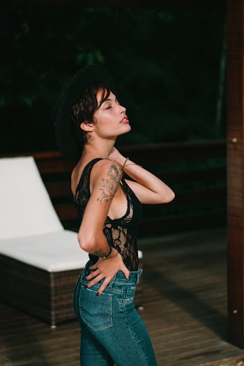 Shallow Focus Photo of Woman Wearing Black Wide Brim Fedora Hat