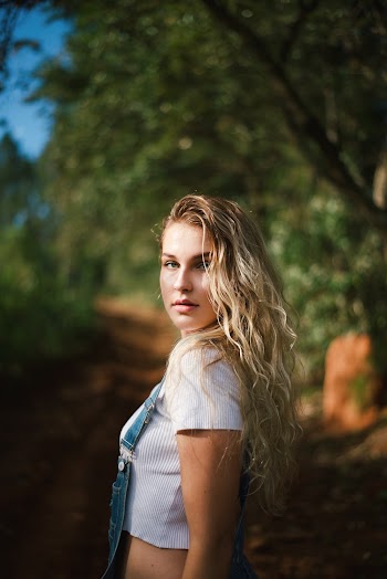 Shallow Focus Photo of Woman Wearing Crop Top