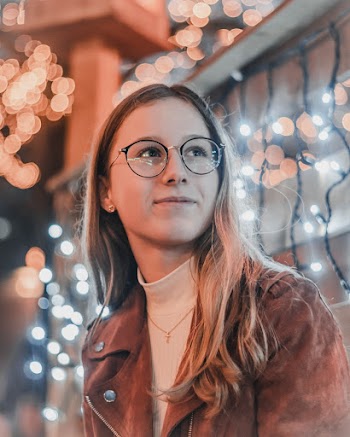 Shallow Focus Photo of Woman Wearing Eyeglasses