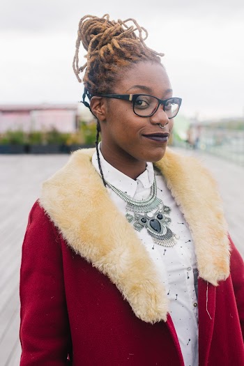 Shallow Focus Photo of Woman Wearing Eyeglasses