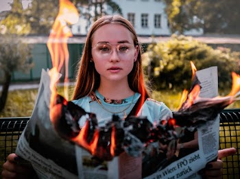 Shallow Focus Photo of Woman Wearing Eyeglasses