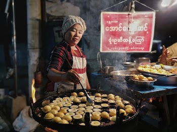 Shallow Focus Photo of Woman Wearing Red and White Apron