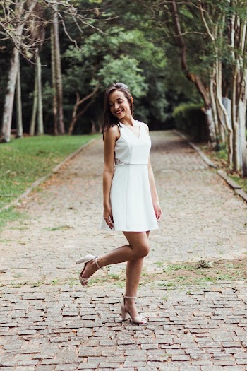 Shallow Focus Photo of Woman Wearing White Dress