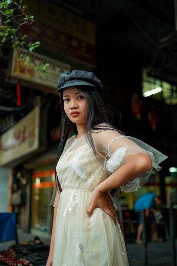 Shallow Focus Photo of Woman Wearing White Dress