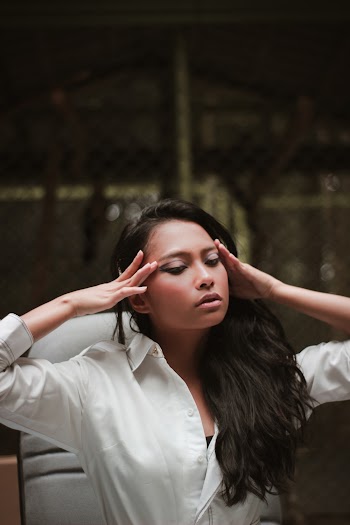 Shallow Focus Photo of Woman Wearing White Dress Shirt