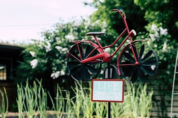 Shallow Focus Photo Red and Black Bicycle Miniature Decor
