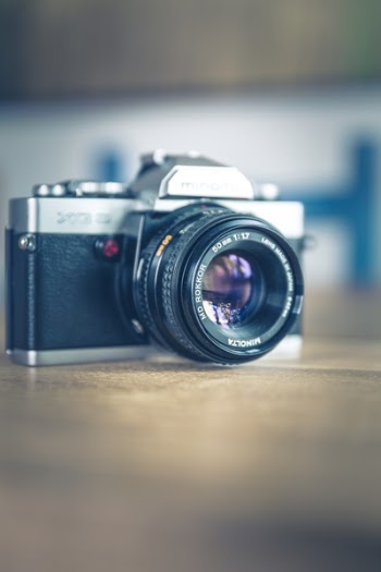 Shallow Focus Photography of Black and Silver Slr Camera